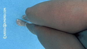 www.carissadumond.com - Carissa in the red dress swimming with no mask thumbnail